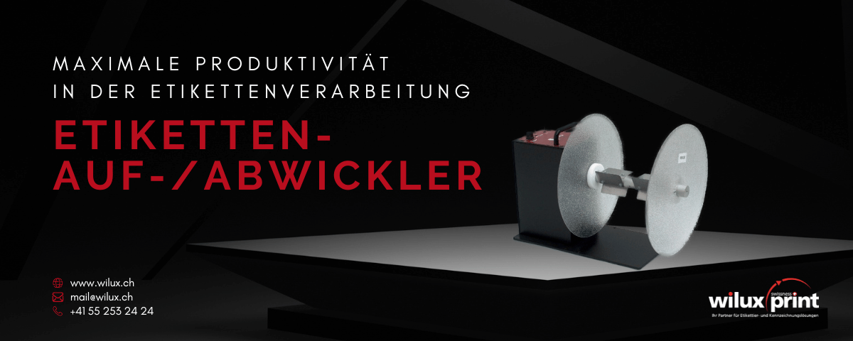 Etiketten-Auf-/Abwickler von Honeywell, Modell Datamax DMXREW2, dargestellt vor einem dunklen Hintergrund mit Text: "Maximale Produktivität in der Etikettenverarbeitung". Das Gerät steht auf einer Plattform.
