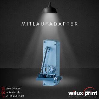 Mitlaufadapter MA am WILUX System PLS41xx für direkte Etikettierung auf bewegte Produkte im Durchlauf
